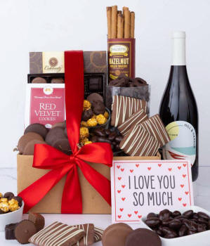 Chocolate wine gift basket with sweet treats and red wine