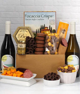 A gift set featuring two bottles of Hill & Harbor wine - white and red, focaccia crisps, 2 cheeses, mustard, summer sausage, caramel popcorn, chocolate pretzels, and 6 chocolate-covered Oreos for a sweet and savory gourmet experience.