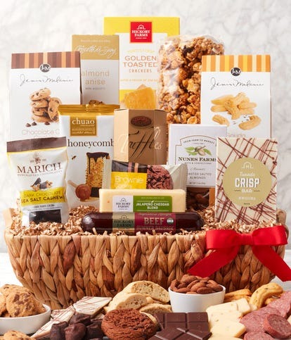 A gourmet gift basket filled with sausage, cheese, chocolate and more a great thanksgiving gift