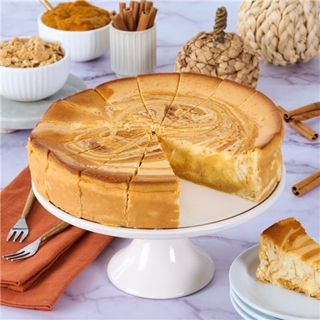 Pumpkin Cheesecake with cookie crust and pumpkin swirl