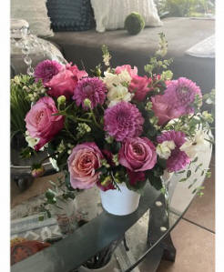 A lovely bouquet of mixed flowers with purple accents