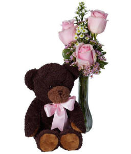 Teddy bear and pink roses
