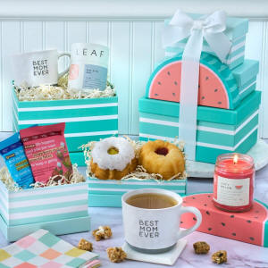 A gift basket filled with tea, donuts and more for Mothers Day