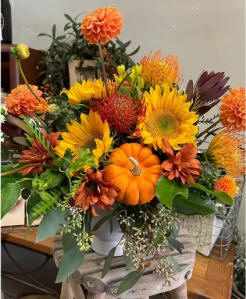 A colorful bouquet of mixed flowers in a vase