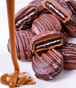 Sea-salt caramel Oreo cookies dipped in Belgian milk chocolate with drizzle