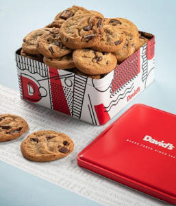 Chocolate chip cookies in a David's Cookies gift tin