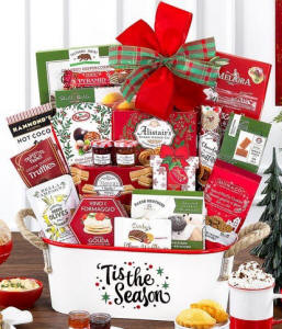 Deck the Halls Christmas gift basket decorated with evergreen accents and festive ribbon