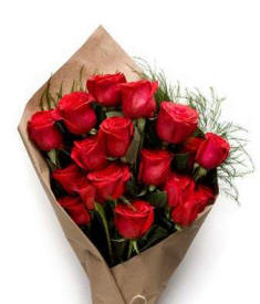 Red Roses In Long Valley Wrapped In Brown Paper For Valentines Day