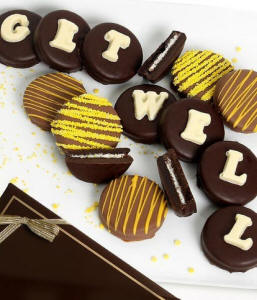 chocolate-covered Oreo cookies spelling 'Get Well' on a white tray