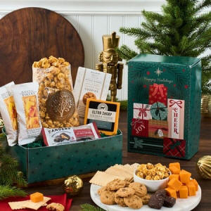 Holiday gift box filled with Christmas sweets, snacks and gourmet treats in a festive box