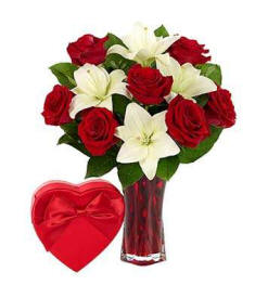 Red Roses Mixed With White Lilies and A Box Of Chocolate In A Red Box
