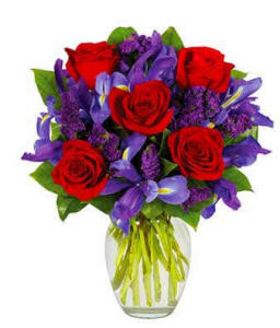 Red roses and blue and purple irises for a romantic flower bouquet