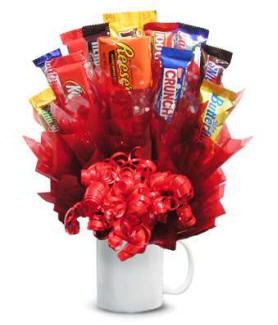 A candy bouquet with a variety of popular candy bars arranged like a bouqet of flowers