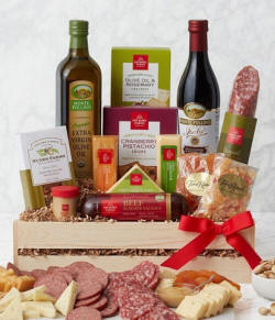 Gourmet gift box with salami, cheese, nuts, crackers, and balsamic vinegar.